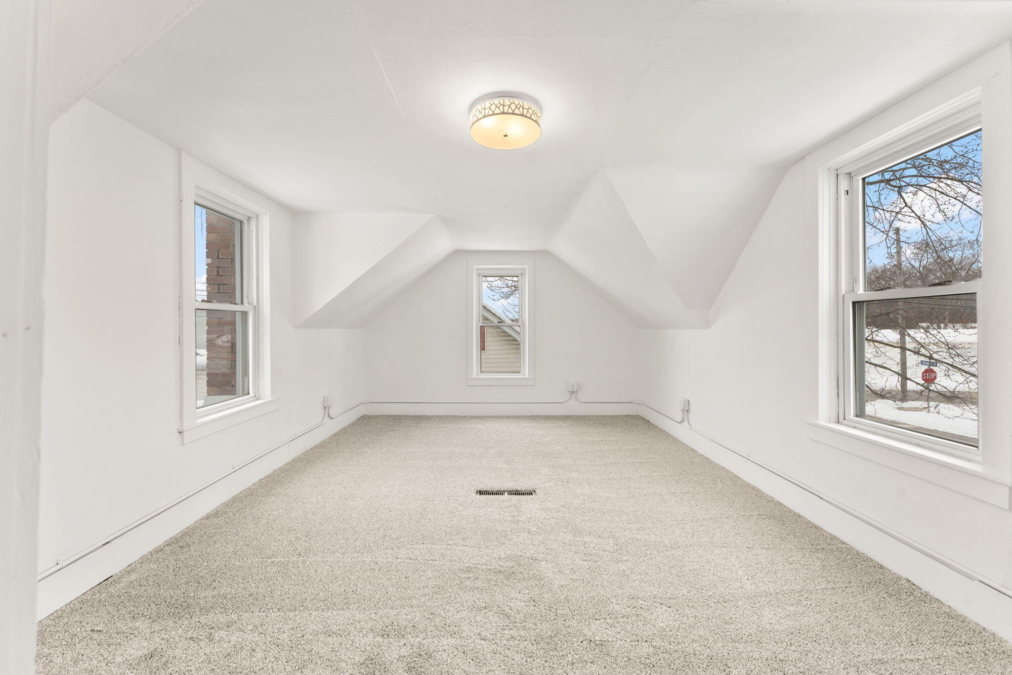 107 Franklin Street Porter, IN 46304 - Photo 17 of 22 an empty room with windows and closet