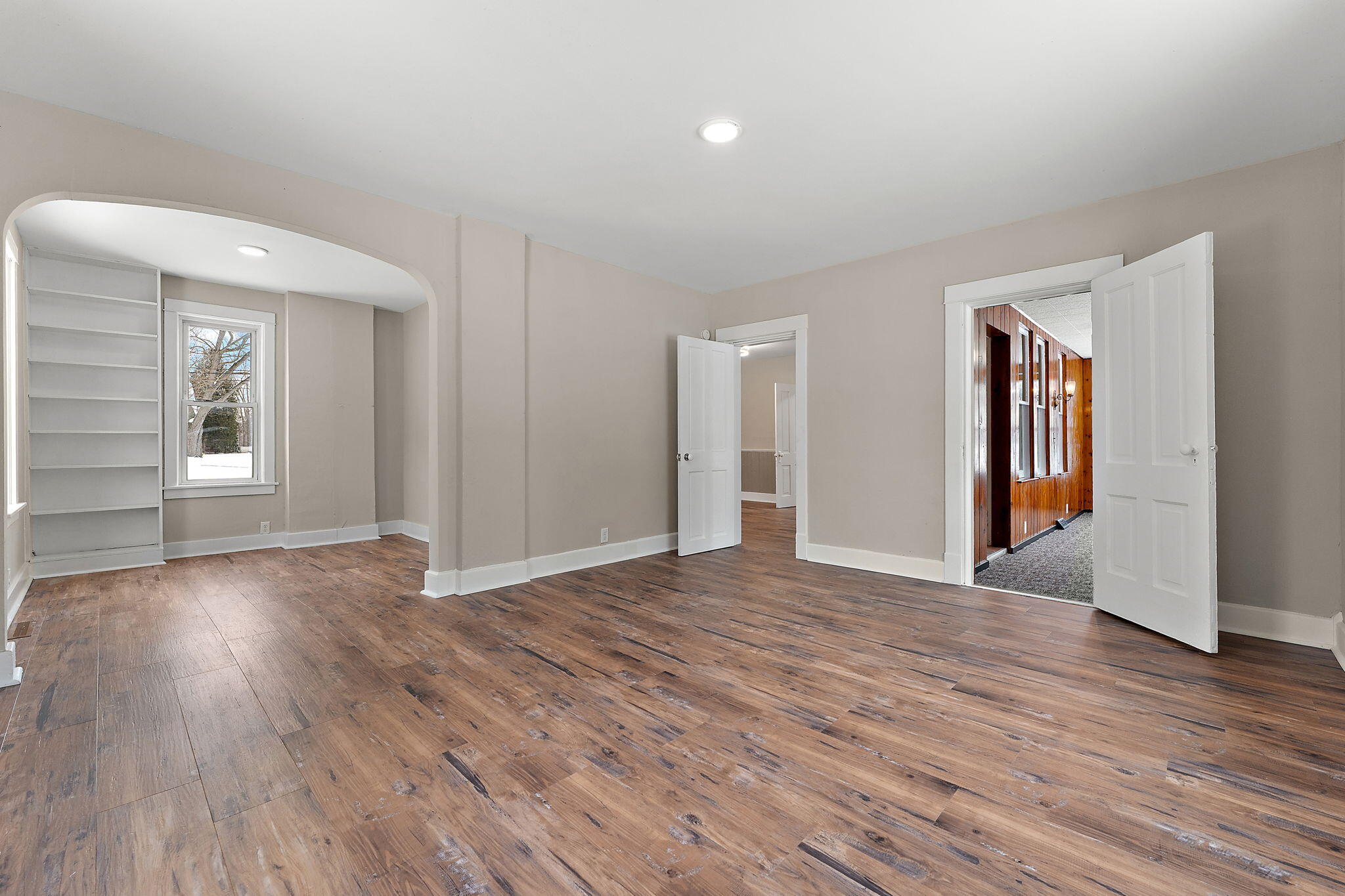 107 Franklin Street Porter, IN 46304 - Photo 3 of 22 a view of an empty room with wooden floor and closet