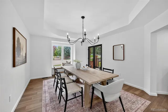 a bed room with a bed and a large window