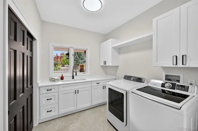 a bathroom with a bathtub and window