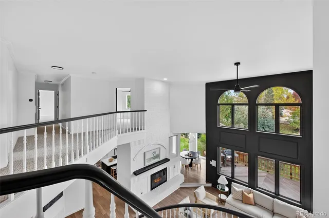 a bathroom with a sink and mirror with bathtub