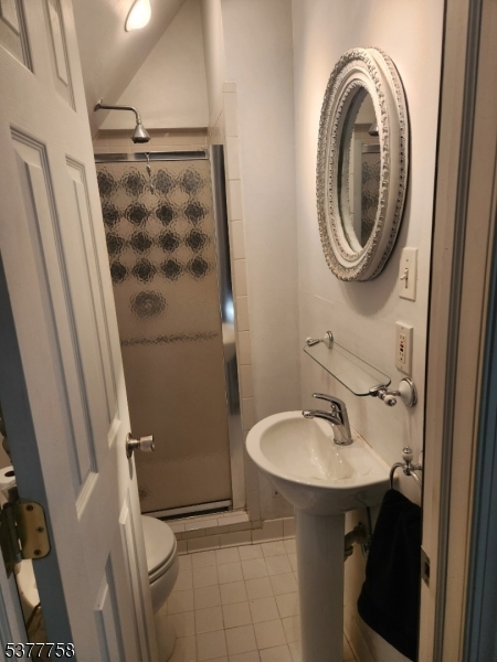 46 Glenside Trail Sparta, NJ 07871 - Photo 12 of 31 a bathroom with a sink a toilet and shower