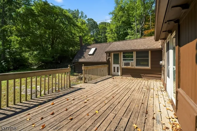 a kitchen with stainless steel appliances a sink stove and cabinets
