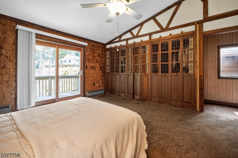 46 Glenside Trail Sparta, NJ 07871 - Photo 18 of 31 a spacious bedroom with a large bed and a large window