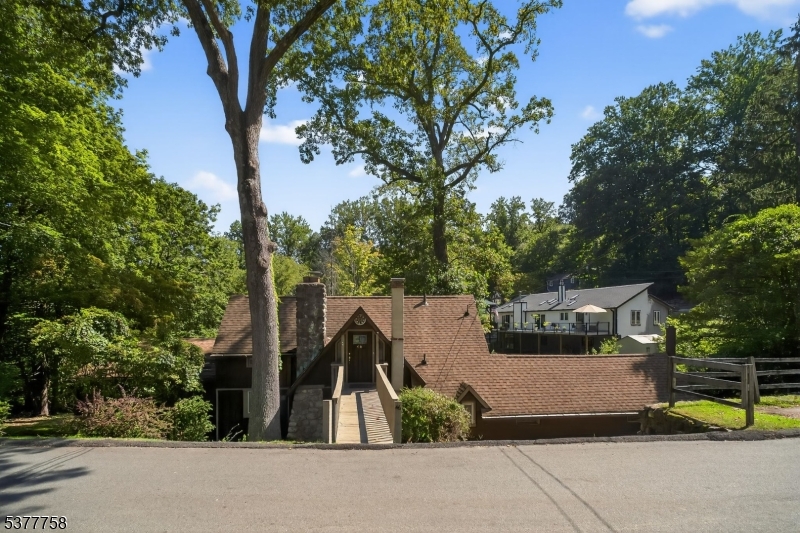 46 Glenside Trail Sparta, NJ 07871 - Photo 2 of 31 a view of a street that has a tree