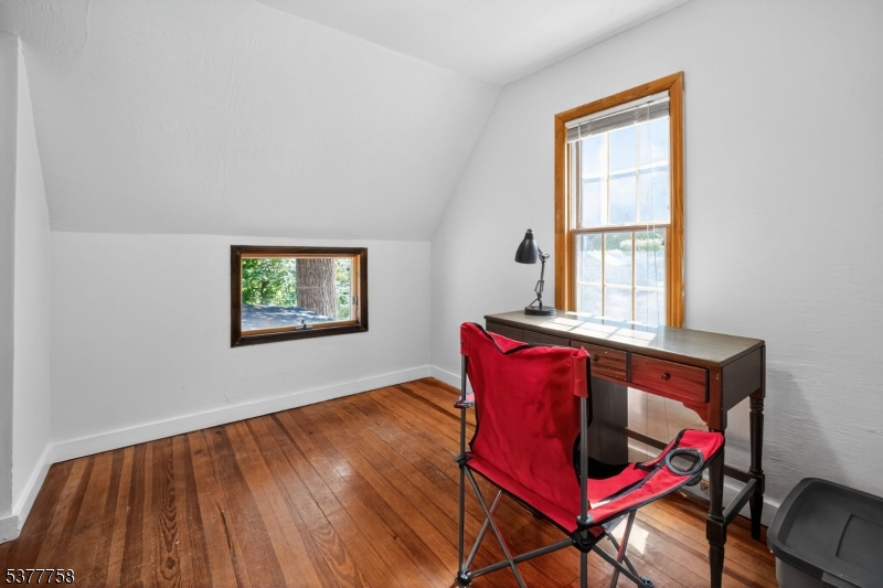 46 Glenside Trail Sparta, NJ 07871 - Photo 25 of 31 a living room with furniture and a window