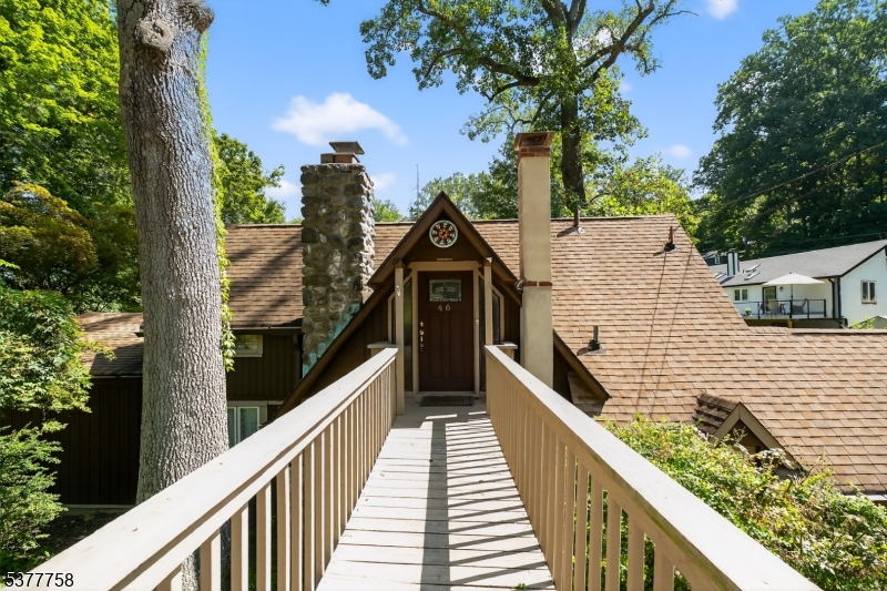 46 Glenside Trail Sparta, NJ 07871 - Photo 26 of 31 a view of balcony with wooden floor and fence