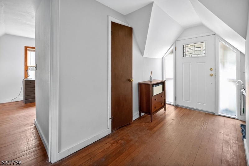 46 Glenside Trail Sparta, NJ 07871 - Photo 27 of 31 a view of a hallway with wooden floor and closet