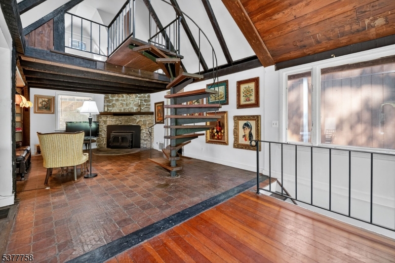46 Glenside Trail Sparta, NJ 07871 - Photo 3 of 31 a living room with furniture and a fireplace