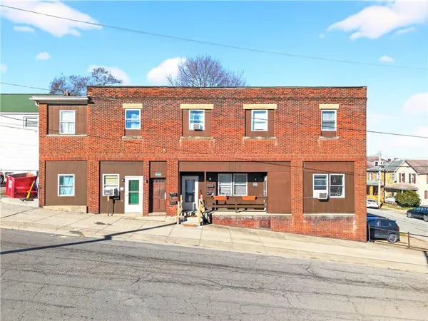 a front view of a building with street