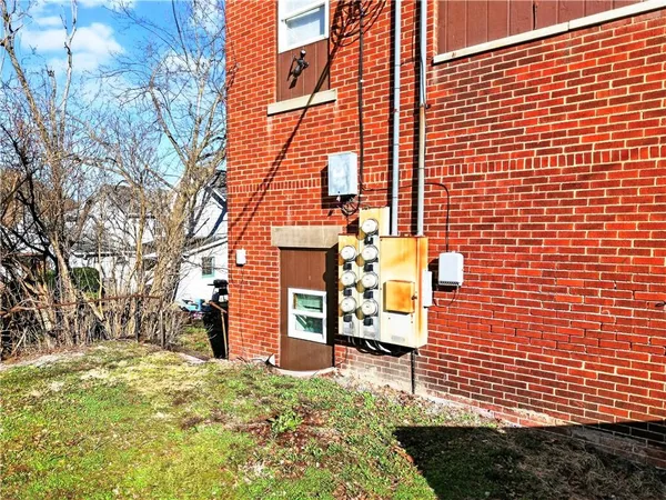 a view of a building with sitting area
