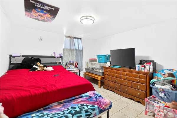 a bathroom with a sink mirror and toilet