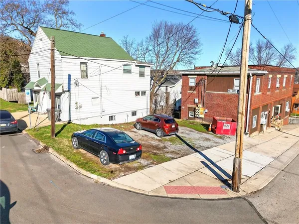 a front view of a building with retail shops