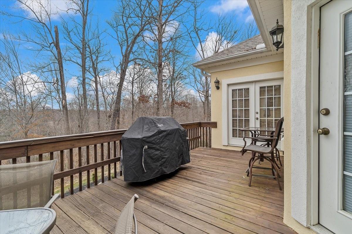 326 Point Carpenter Road Indian Land, SC 29707 - Photo 32 of 48 a view of a chair and table on the wooden floor