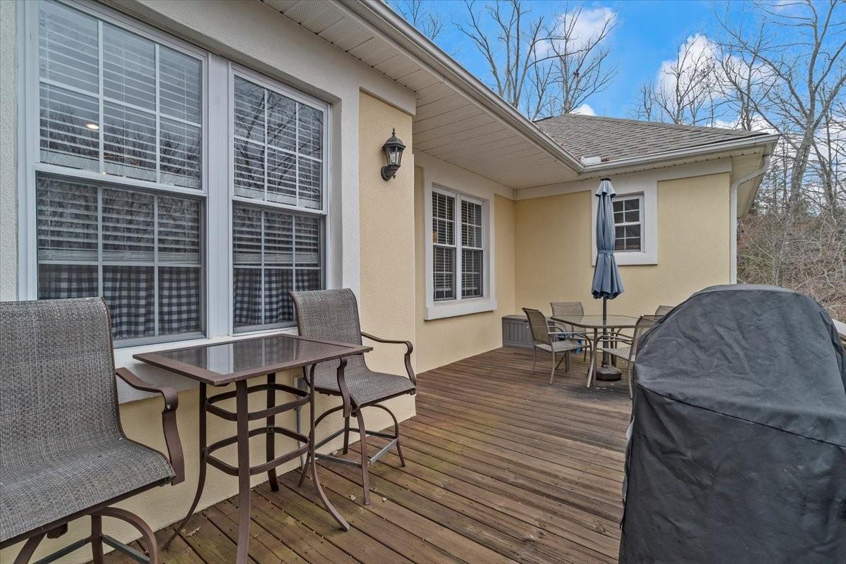 326 Point Carpenter Road Indian Land, SC 29707 - Photo 33 of 48 a backyard of a house with table and chairs