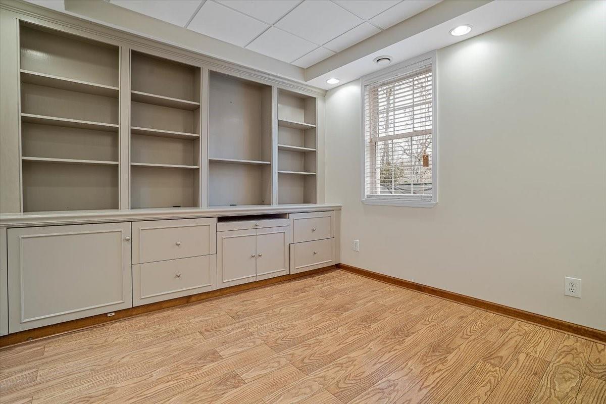 326 Point Carpenter Road Indian Land, SC 29707 - Photo 43 of 48 a room with a window and cabinet