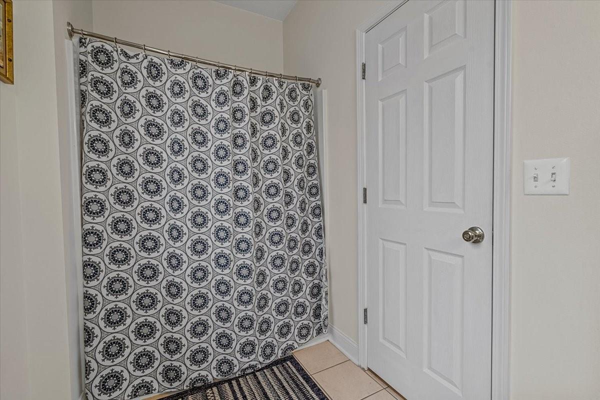 326 Point Carpenter Road Indian Land, SC 29707 - Photo 10 of 48 a bathroom with a shower curtain