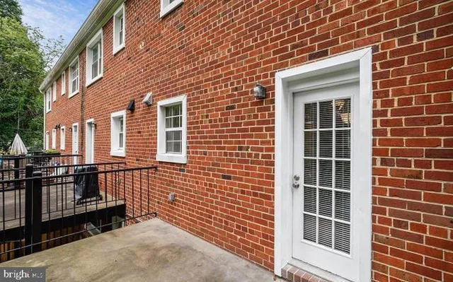 a view of a brick house with a window