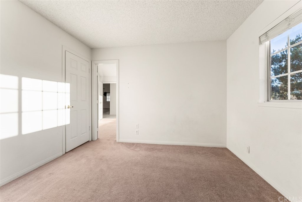 1856 Gird Road Fallbrook, CA 92028 - Photo 11 of 39 an empty room with windows and entrance