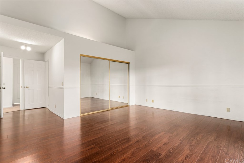 1856 Gird Road Fallbrook, CA 92028 - Photo 17 of 39 a view of an empty room with wooden floor and a window