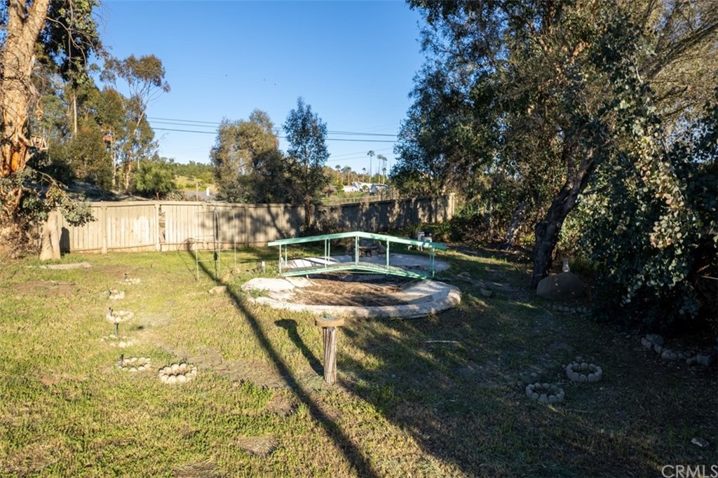1856 Gird Road Fallbrook, CA 92028 - Photo 31 of 39 a view of a swimming pool with an outdoor space and seating area