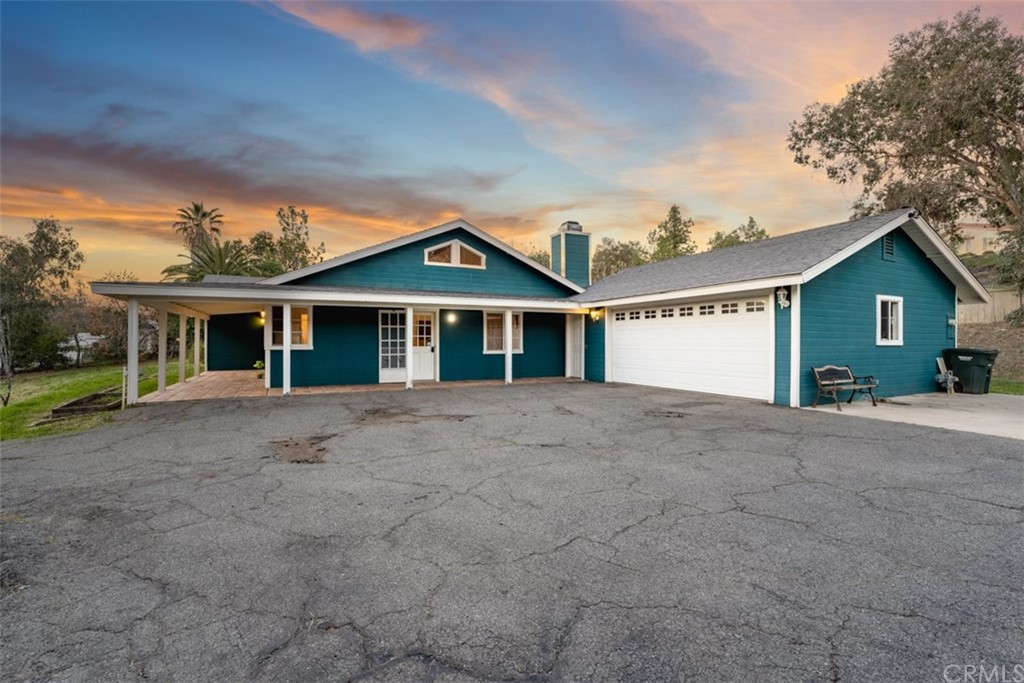 1856 Gird Road Fallbrook, CA 92028 - Photo 38 of 39 front view of a house with a garden