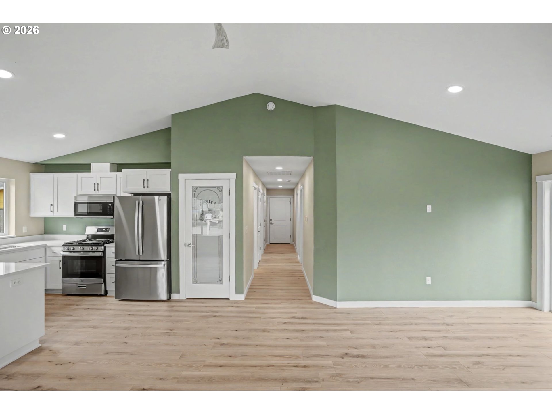 7425 5th Street Southeast Turner, OR 97392 - Photo 16 of 47 a view interior of kitchen and wooden floor