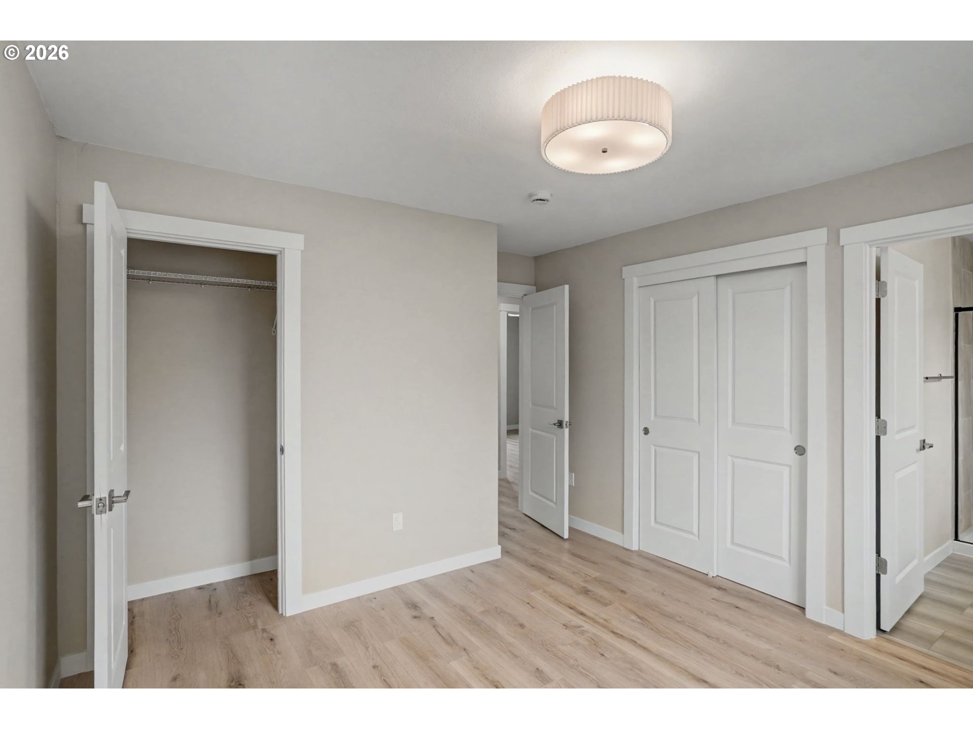 7425 5th Street Southeast Turner, OR 97392 - Photo 24 of 47 a view of an empty room and wooden floor