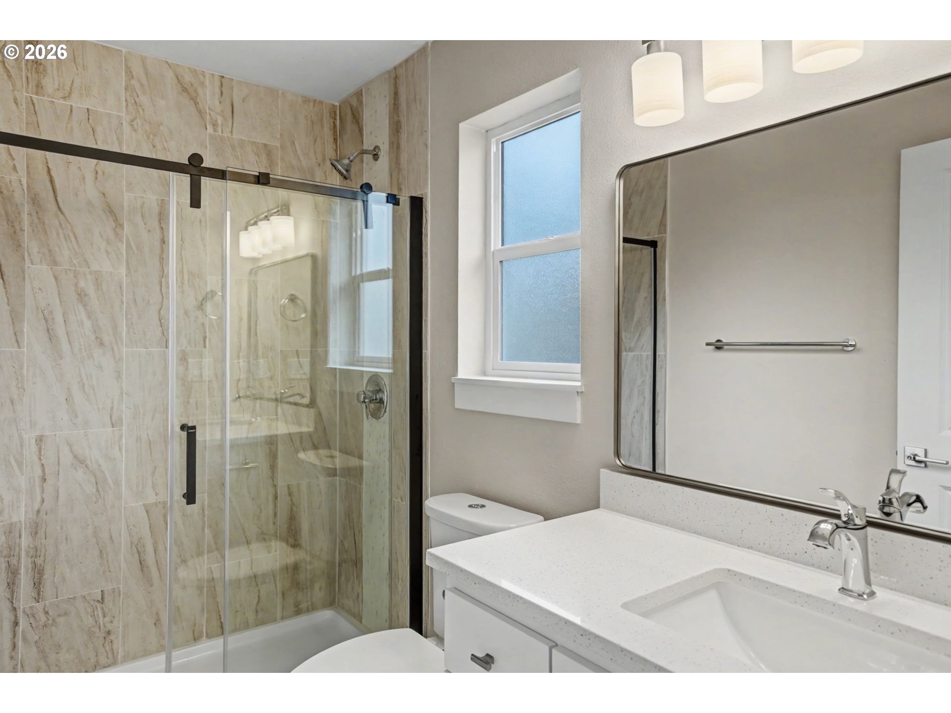 7425 5th Street Southeast Turner, OR 97392 - Photo 25 of 47 a bathroom with a shower and a sink