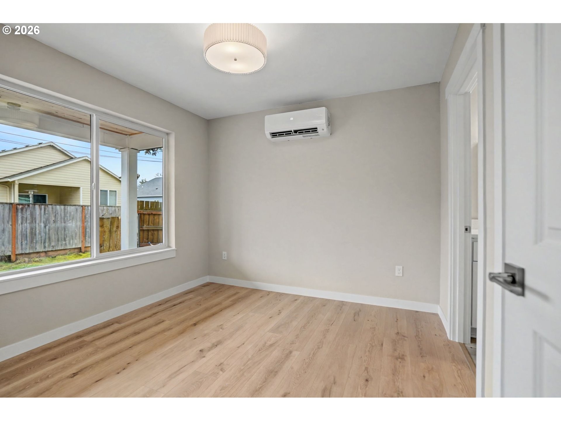 7425 5th Street Southeast Turner, OR 97392 - Photo 29 of 47 a view of an empty room with a window