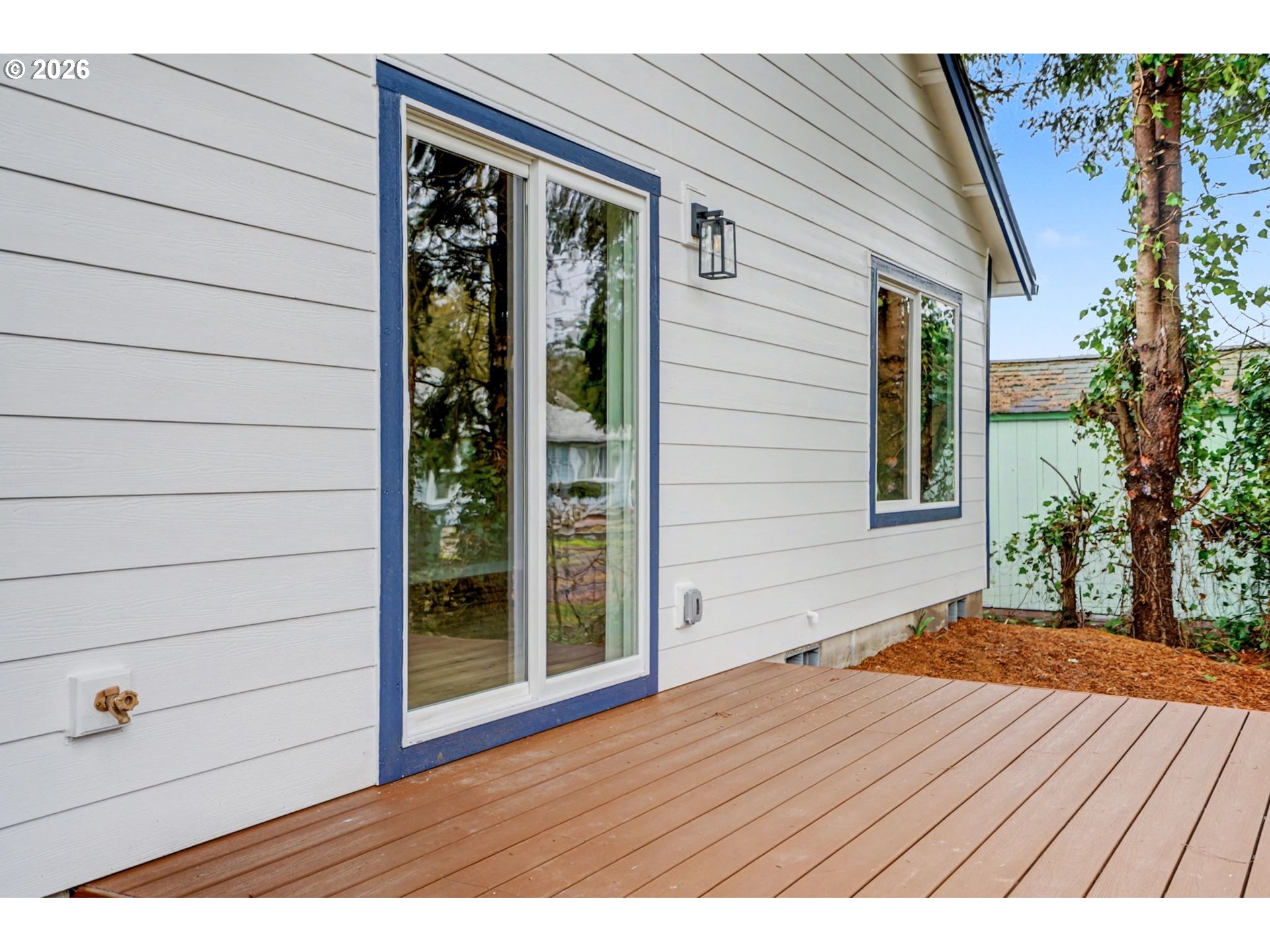 7425 5th Street Southeast Turner, OR 97392 - Photo 34 of 47 a view of backyard with wooden floor and potted plants