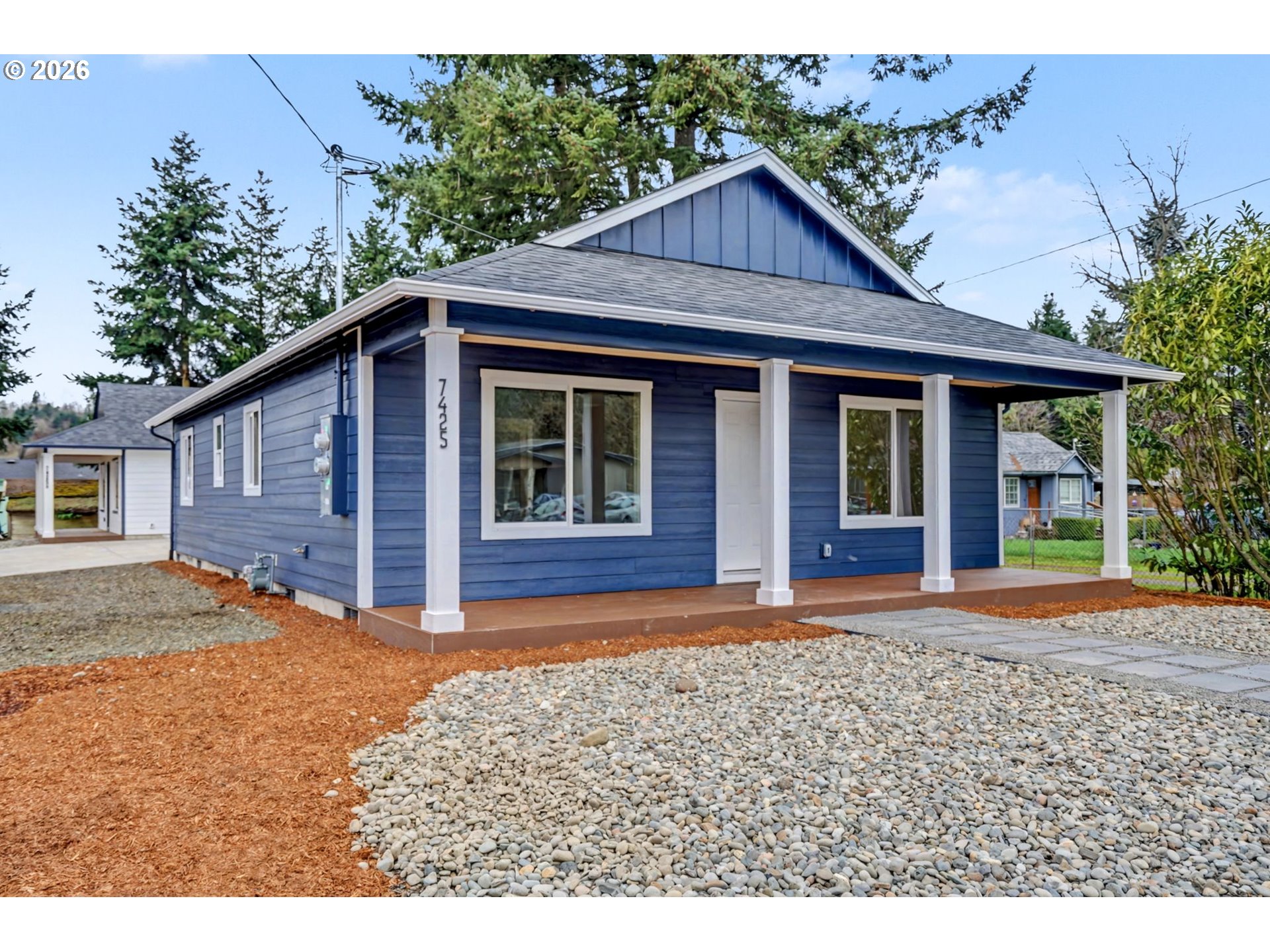 7425 5th Street Southeast Turner, OR 97392 - Photo 47 of 47 a front view of a house with a yard