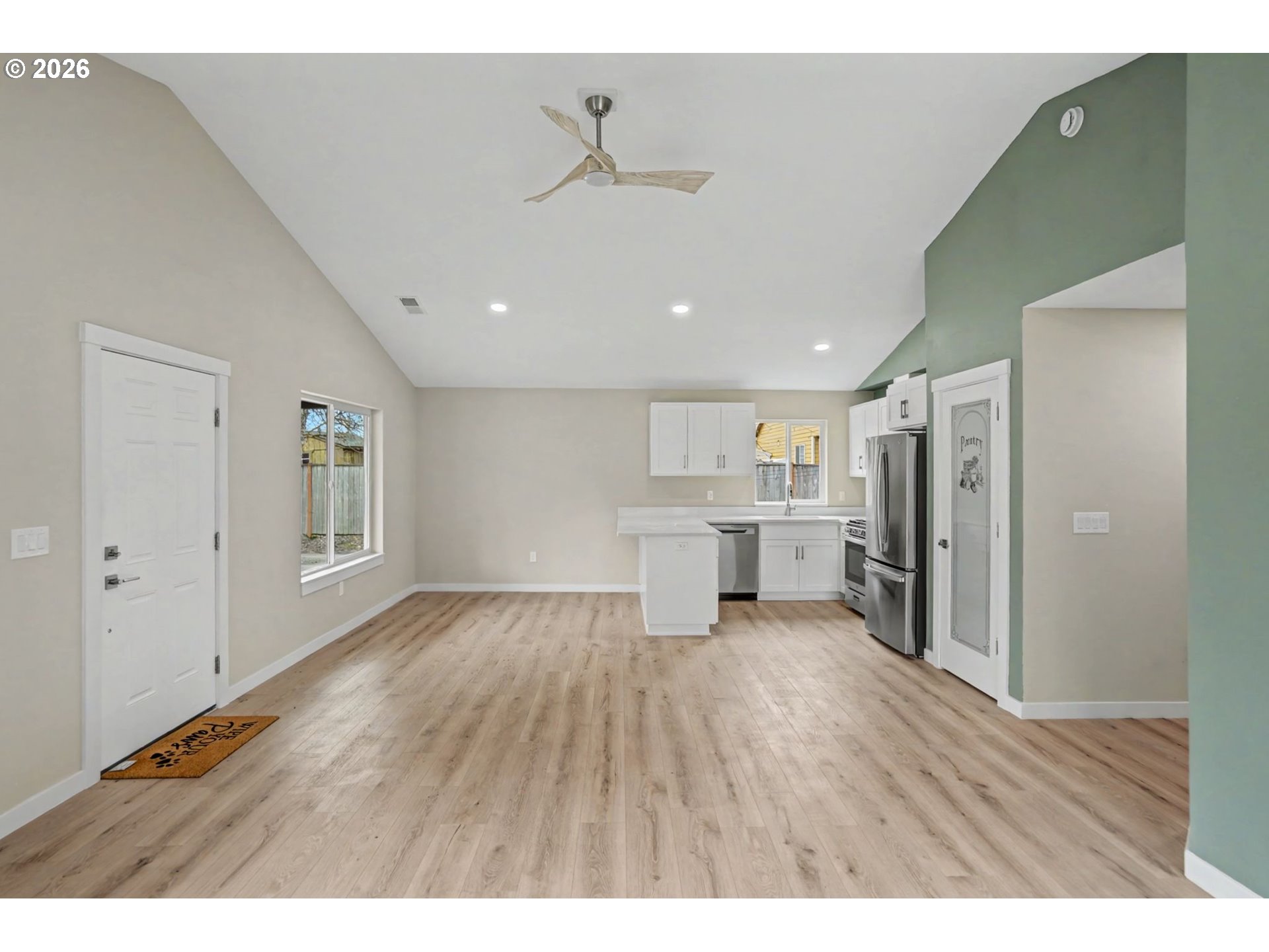 7425 5th Street Southeast Turner, OR 97392 - Photo 9 of 47 a view of a kitchen with wooden floor