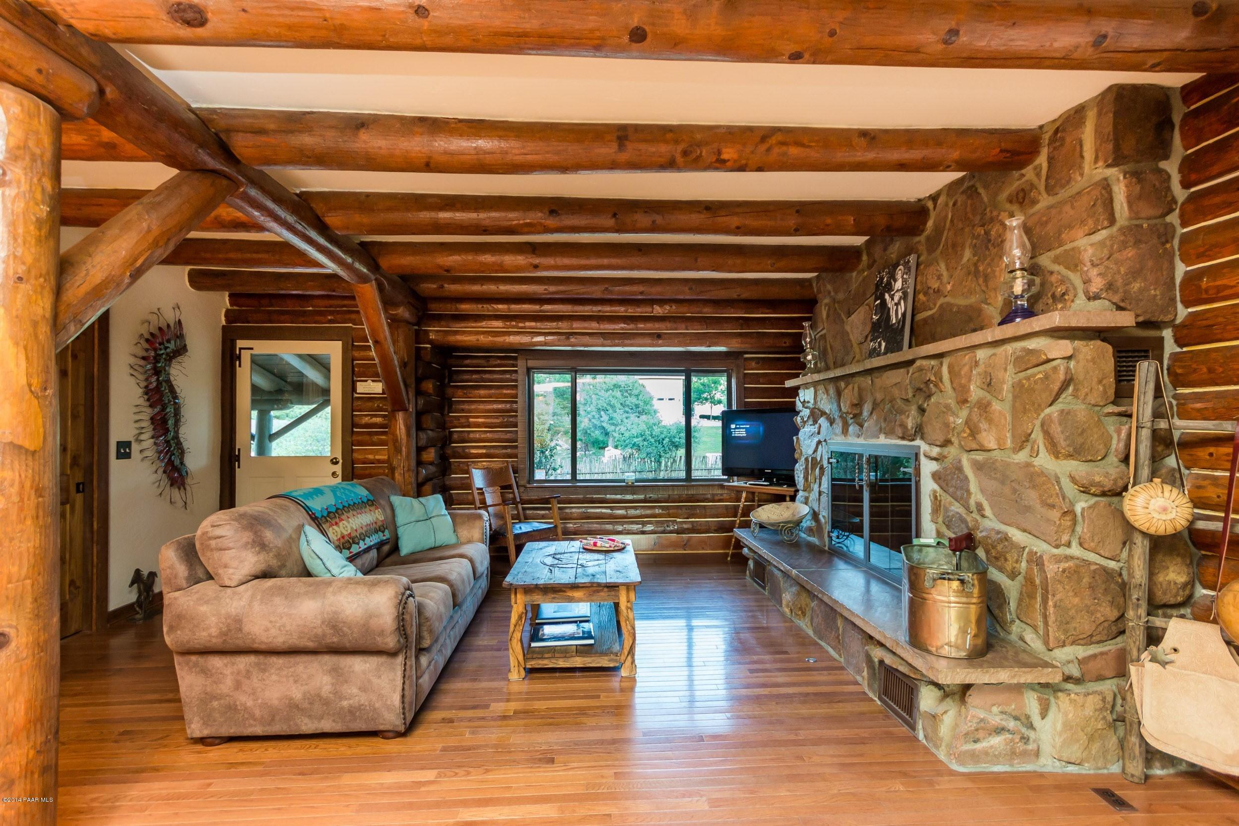 2260 Shadow Valley Ranch Road Prescott, AZ 86305 - Photo 4 of 16 Living Room with rustic rock fireplace