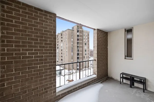 a view of an empty room with a window