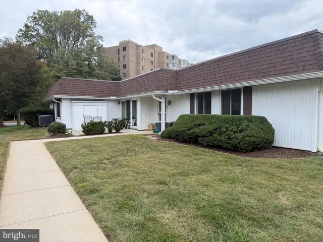 a house view with a garden space