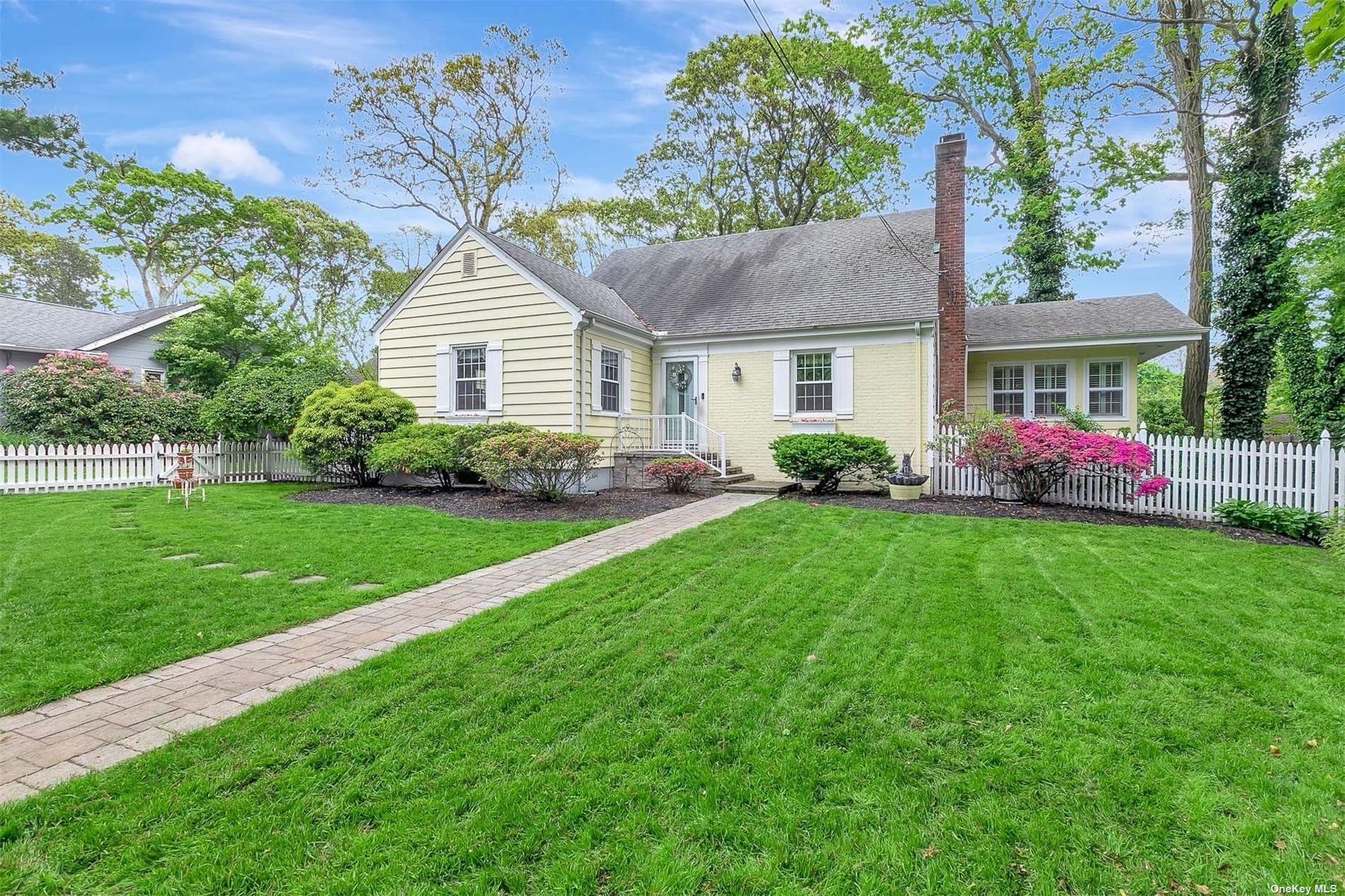18 Pine Hill Road Port Jefferson, NY 11777 - Photo 1 of 1 a front view of house with yard and green space