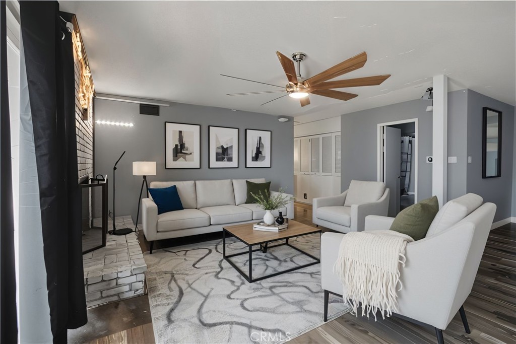 14798 Keota Road Apple Valley, CA 92307 - Photo 5 of 27 a living room with furniture and a large window