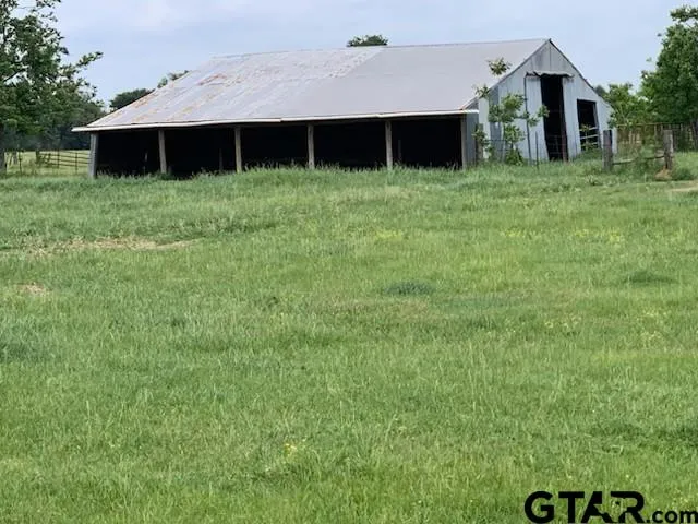 a view of a lake and a yard