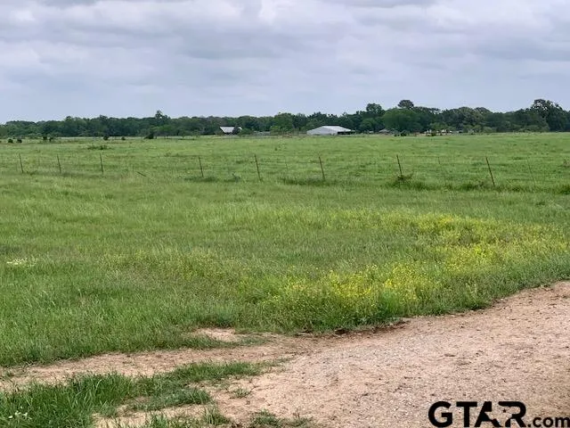 a view of lake with green space