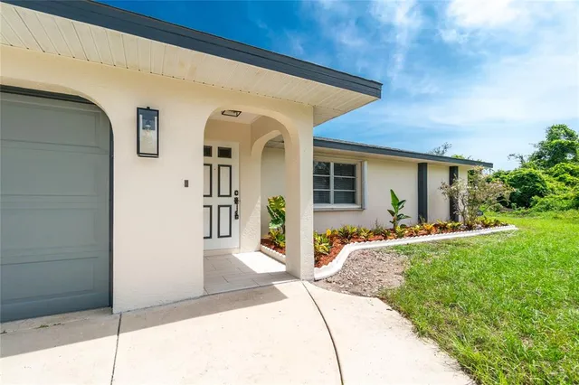 a front view of a house with a porch