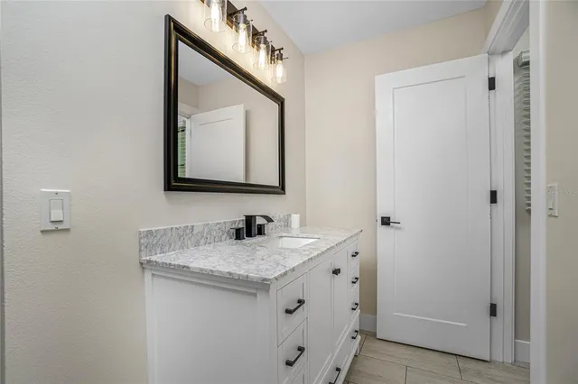 a bathroom with a shower and toilet