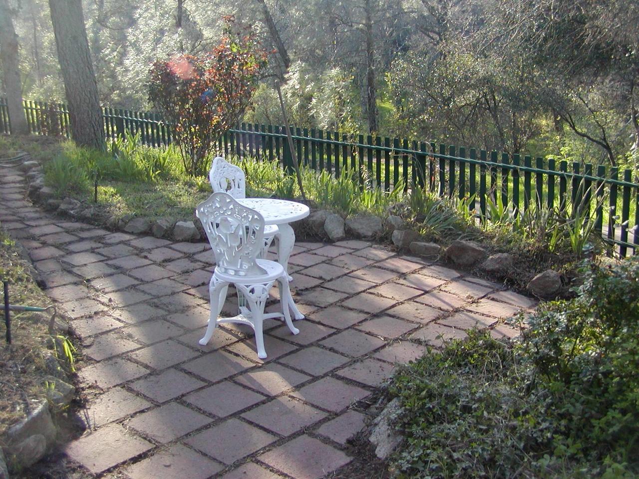 15916 Lower Springs Road Redding, CA 96001 - Photo 4 of 8 a view of a chairs in a backyard