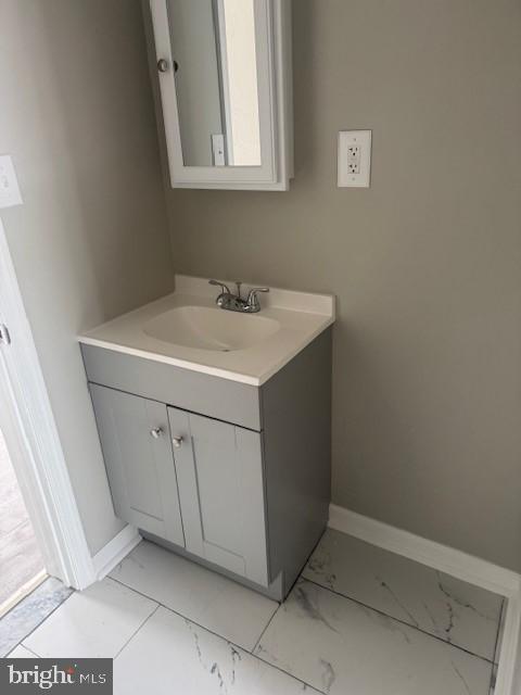 716 Moss Street Reading, PA 19604 - Photo 23 of 29 a utility room with a sink a vanity and mirror