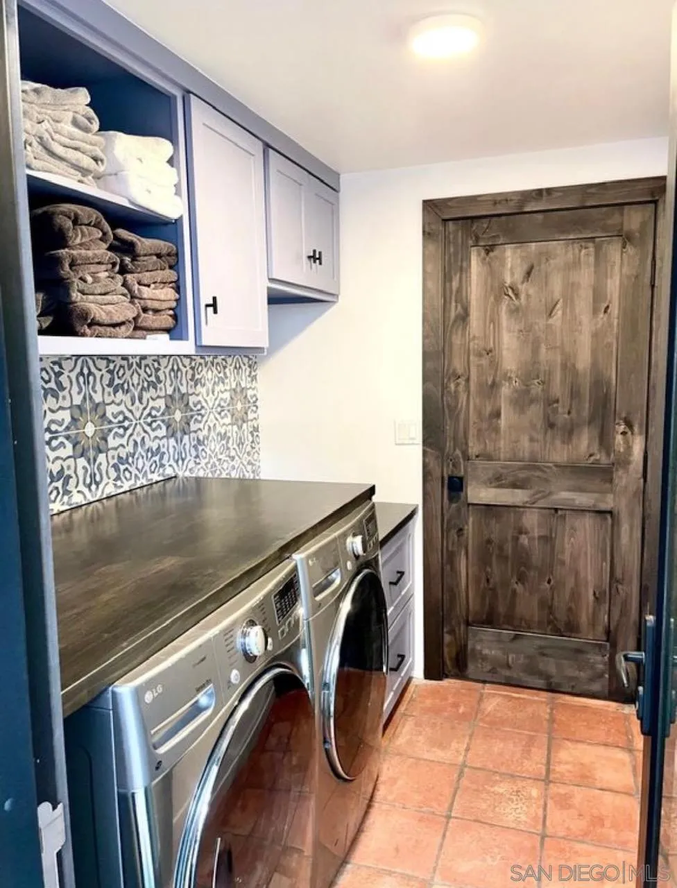 216 21st Street Del Mar, CA 92014 - Photo 22 of 31 a utility room with washer and dryer
