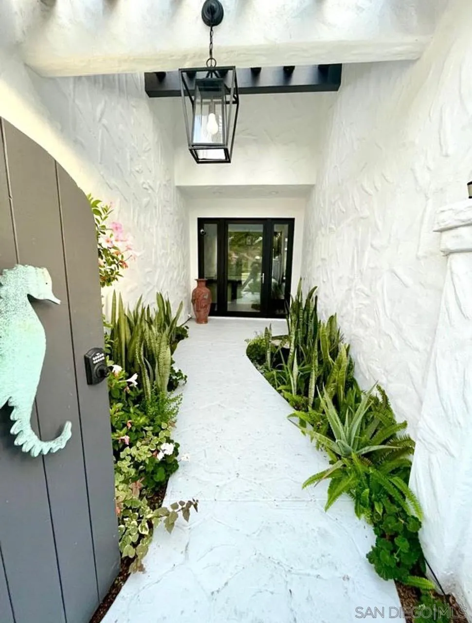 216 21st Street Del Mar, CA 92014 - Photo 29 of 31 a living room with a fireplace