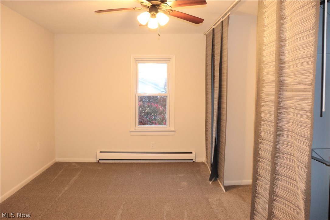 14302 Main Market Road Hiram, OH 44234 - Photo 10 of 20 Master bedroom with two closets and entertainment nook
