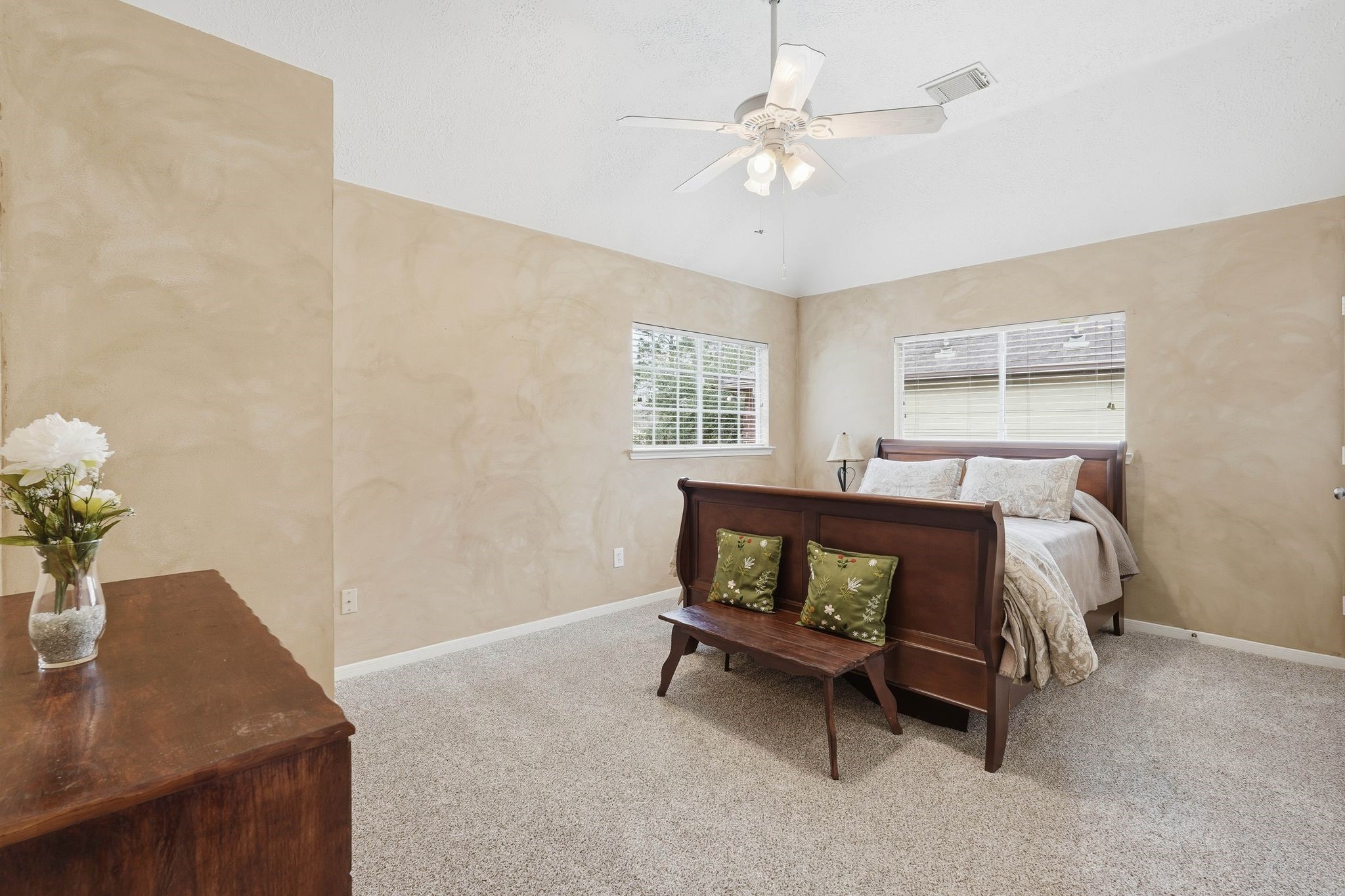 2515 Woodsboro Drive Spring, TX 77388 - Photo 35 of 44 This secondary bedroom features a cozy space with neutral-toned walls and large windows providing natural light.