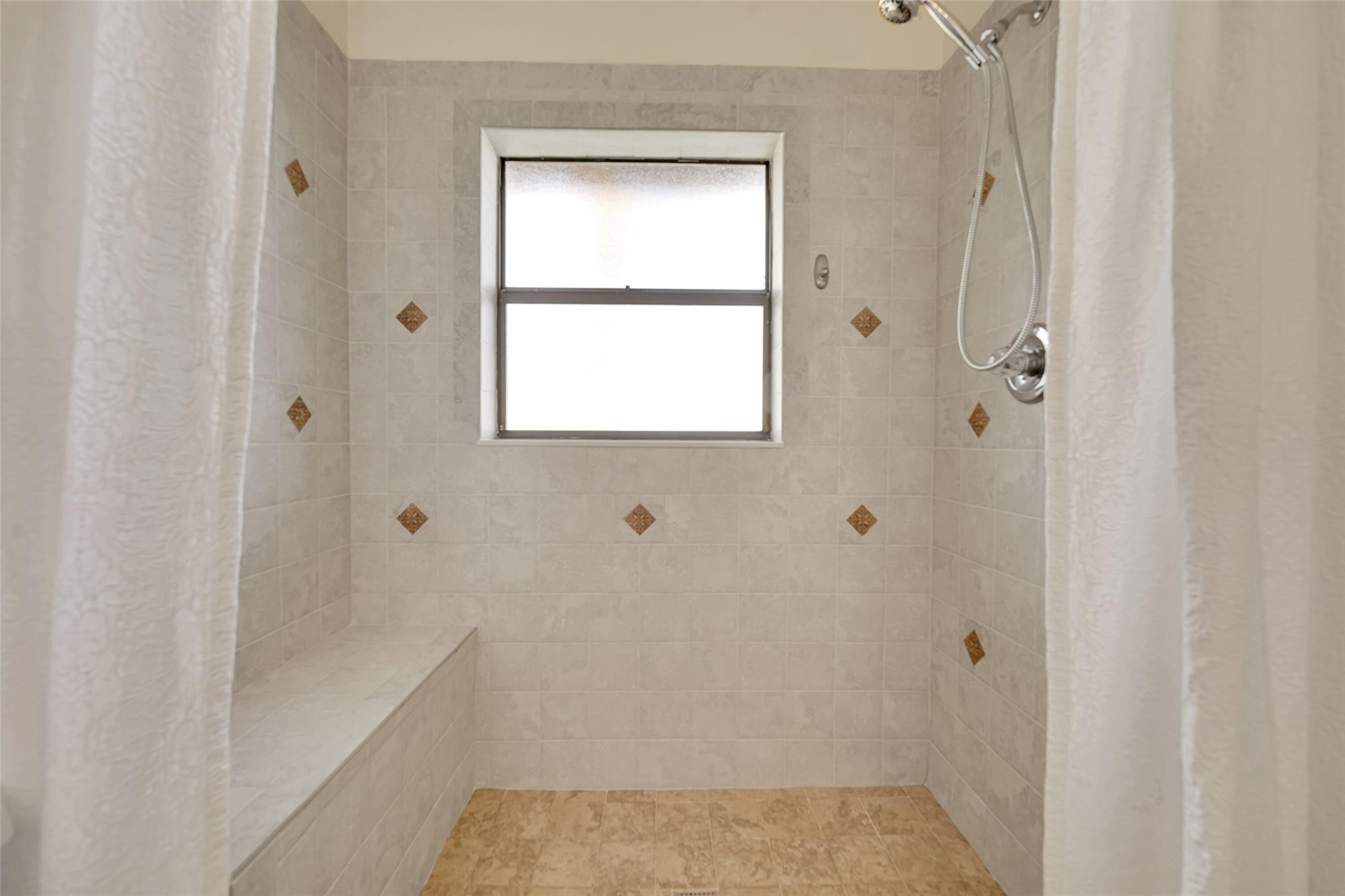 10761 Northwest 14th Street, Unit 281 Plantation, FL 33322 - Photo 17 of 33 a bathroom with a shower