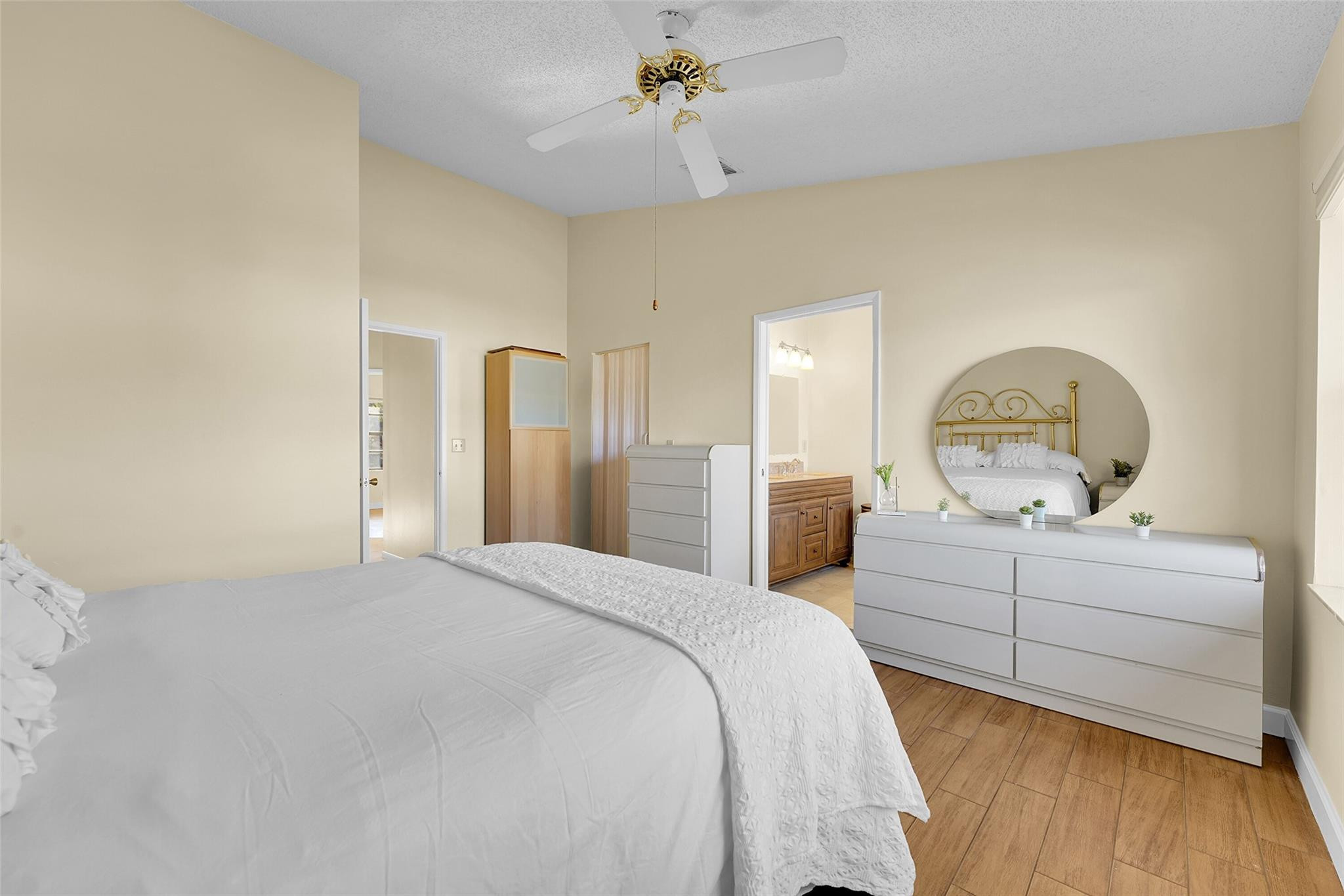 10761 Northwest 14th Street, Unit 281 Plantation, FL 33322 - Photo 21 of 33 a bedroom with bed window and couch